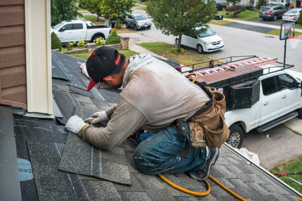 Professional Roofing technician working in Robinson, IL
